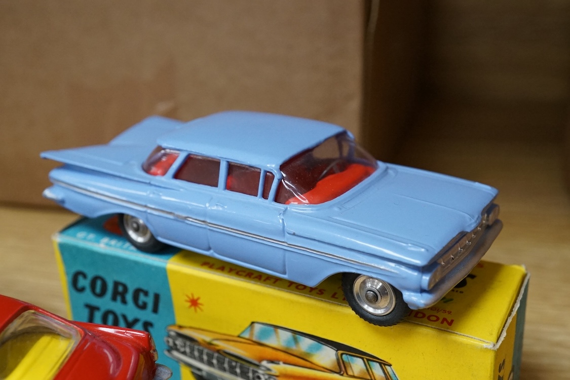 Three boxed Corgi Toys; a Mercedes-Benz 600 Pullman (247) in metallic maroon, a Chevrolet Impala (220), in sky blue with red interior, and an Aston Martin DB4 (218) in red with yellow interior. Condition - good, some dam